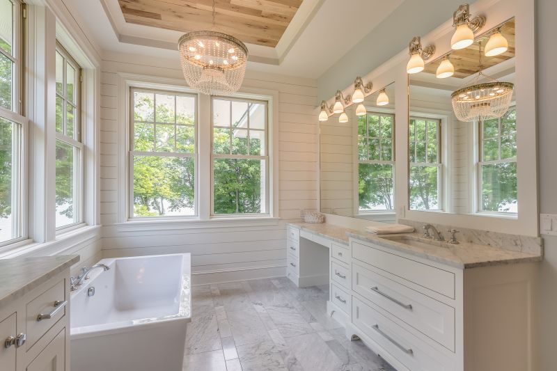 Luxurious bathroom with soaking tub and natural light